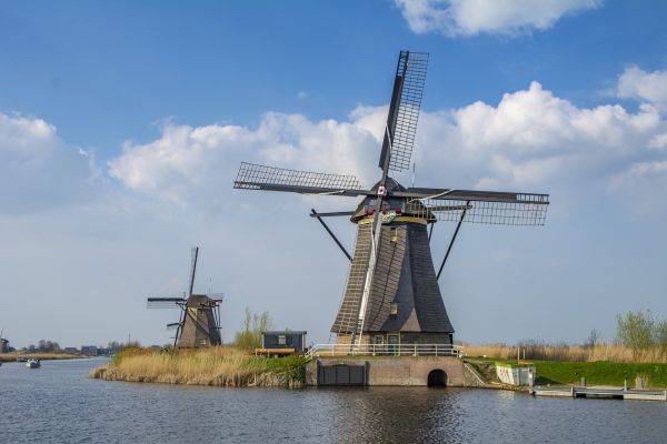 windmill,cloud,sky,water,plant,mill