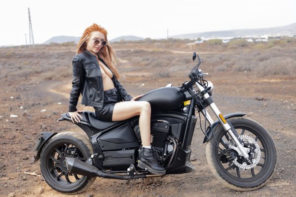 model,road,leather coat,motorcycle,redhead,sexy