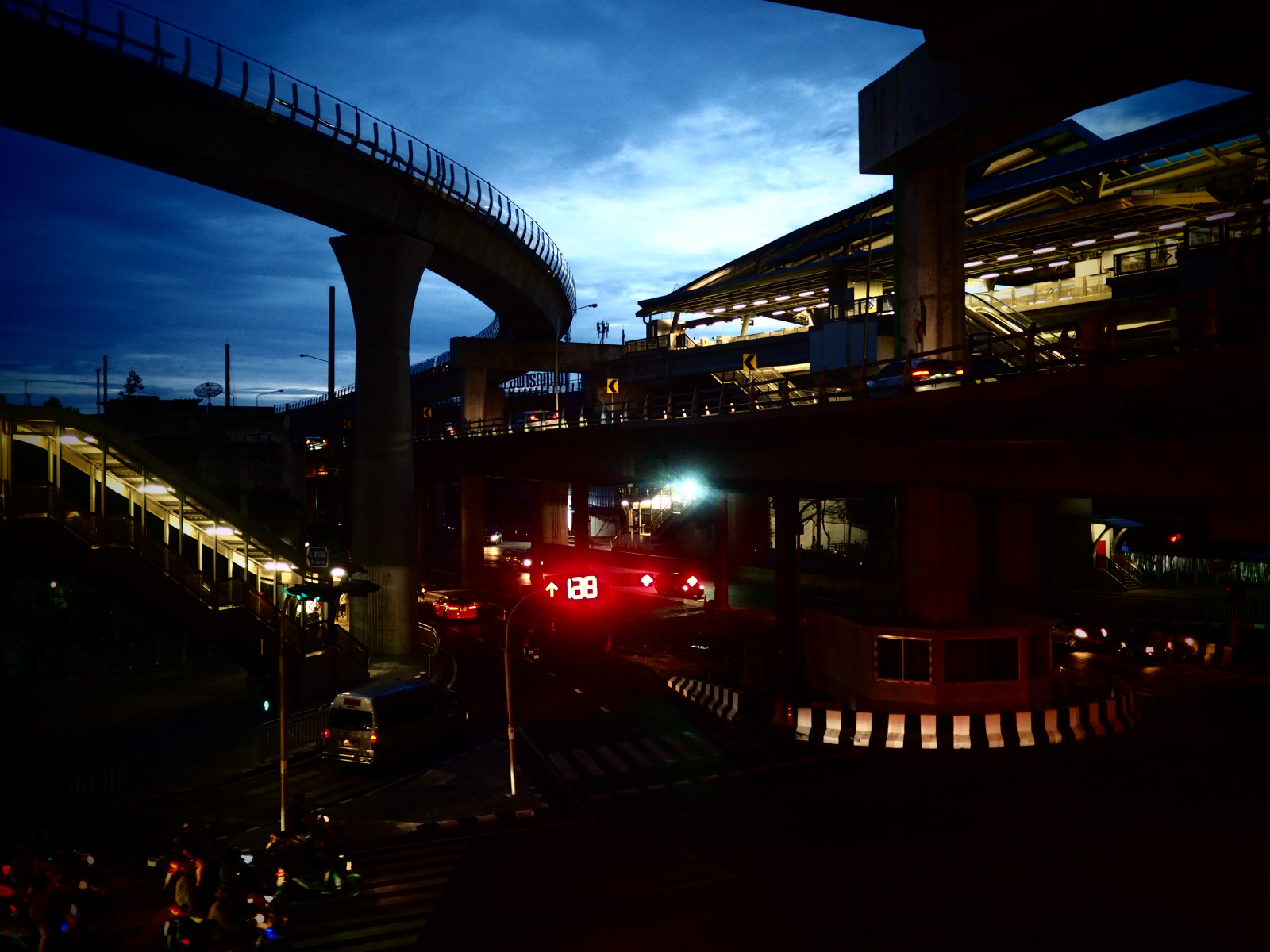 mrt, cloud, sky, building, dusk, cityscape, waterway, city, road, metropolis, automotive lighting, girder bridge, bridge, reflection, midnight, mixed use, overpass, beam bridge, evening, sunset, public transport, darkness, nonbuilding structure, downtown, electricity, fixed link, concrete bridge, railway, horizon, night, box girder bridge, light fixture, facade, street, landscape, transport, arch, river, street light