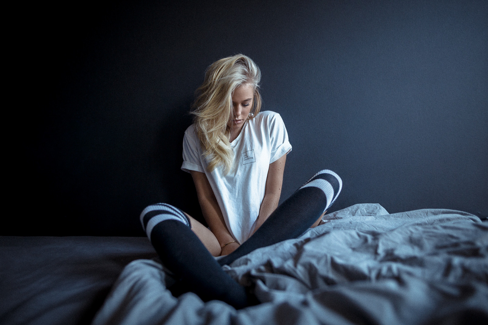 Wallpaper : women, model, blonde, T shirt, sitting, in bed, knee highs