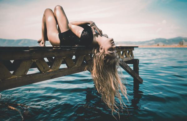 women,model,blonde,long hair,closed eyes,lying on back