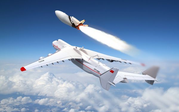 space,sky,vehicle,clouds,airplane,aircraft