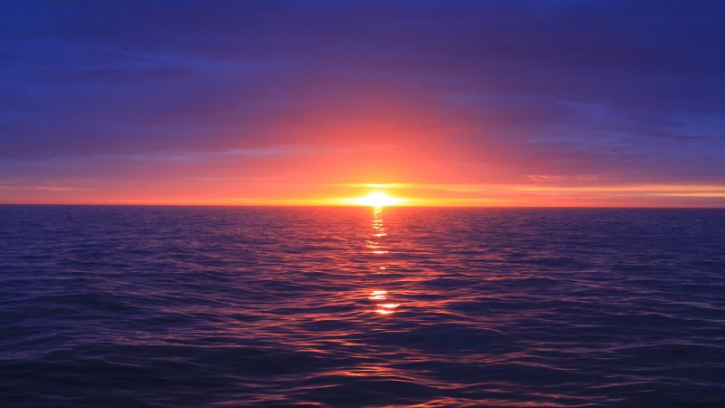 vesi,auringonlasku,pilviä