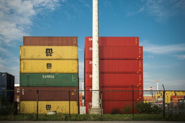 sky,shipping container,building,architecture,residential area,urban area