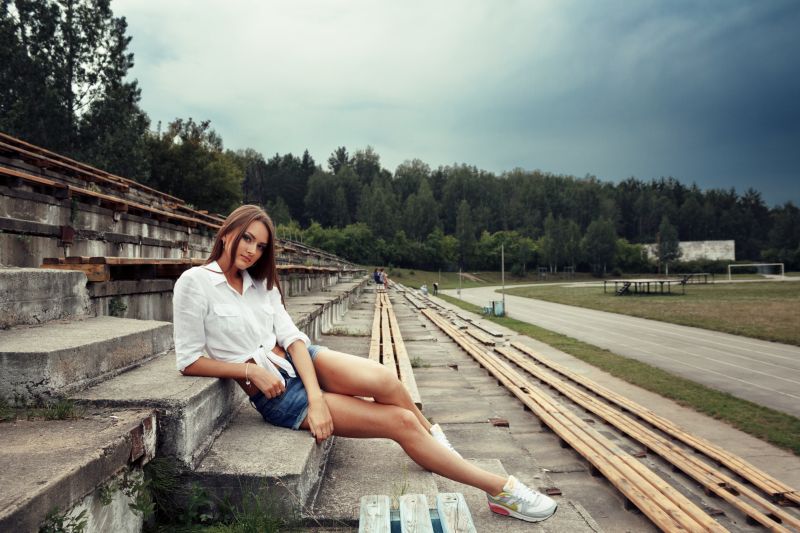 legs, outdoors, sunlight, sky, shorts, jeans legs, outdoors, sunlight, sky, shorts, jeans