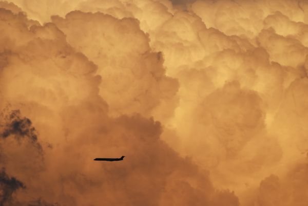 sunlight,sunset,sky,clouds,vehicle,airplane