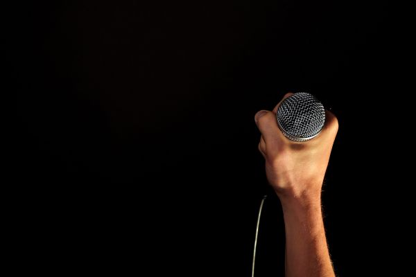 microphone,black,black background,guitar,hand,finger