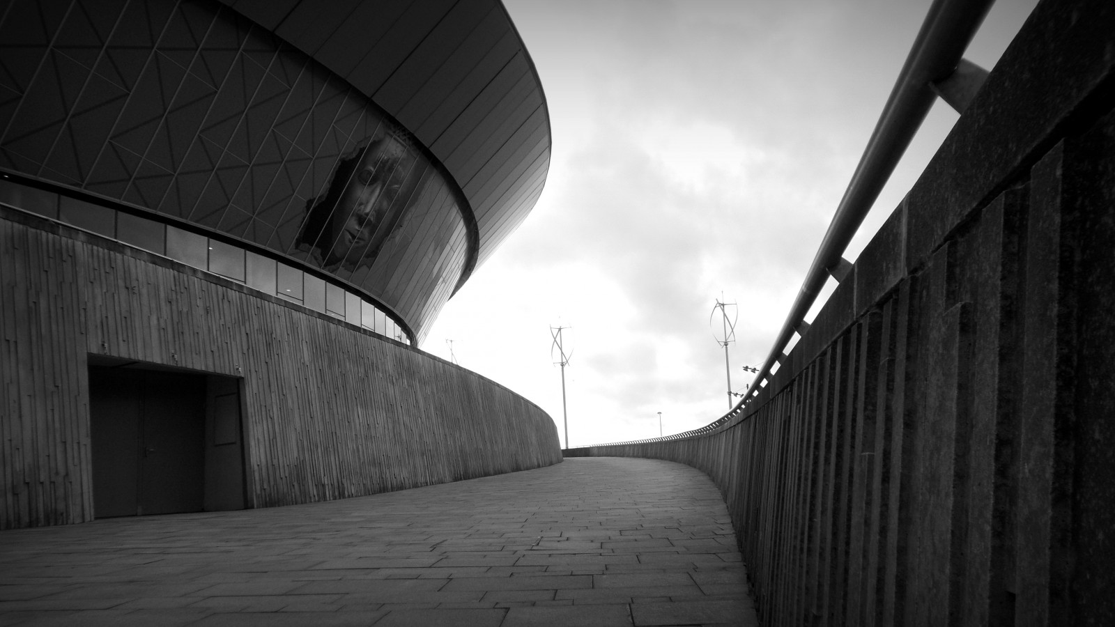 black, sky, black and white, monochrome photography, infrastructure, structure, architecture, photography, light, wall, monochrome, atmosphere, daytime, arch, darkness, line, fixed link, daylighting, building, angle, symmetry, concrete, cloud, facade, alley