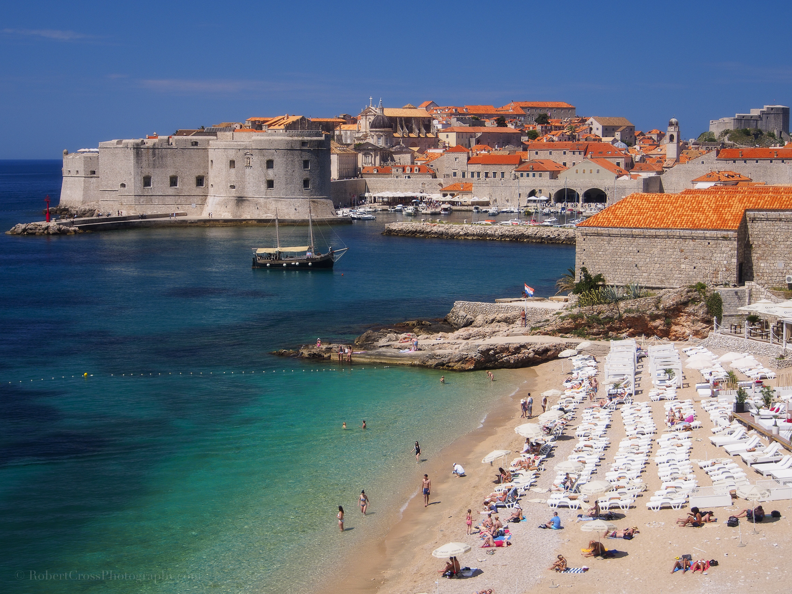 mare, cielo, corpo d'acqua, costa, spiaggia, Turismo, promontorio, coastal and oceanic landforms, puntellare, acqua, vacanza, Terreno, mantellina, baia, oceano, scogliera, sabbia, città, baia, roccia