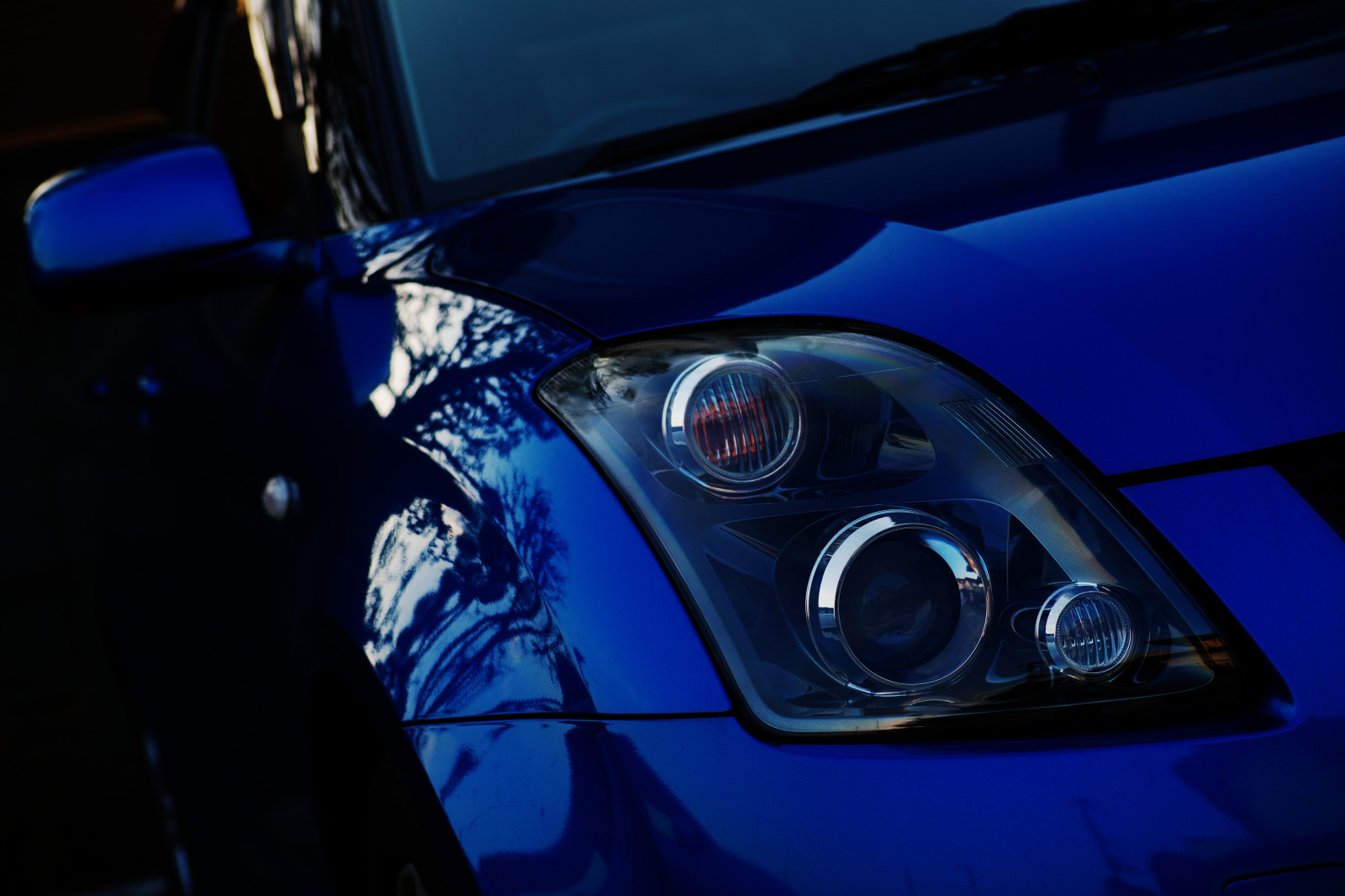 auto, motorové vozidlo, modrý, automotive Lighting, automobilového designu, světlomet, světlo, druh dopravy, vozidlo, kolo, okraj, automotive wheel system, automobilový exteriér, luxusní vůz, fotografování, sportovní auto, nárazník, auto part, rodinný vůz, petrolejově modrá, auto show, městské auto, kapuce, superauto, počítač tapeta, výkon auta, odraz, vlastní auto, nebe, technika, v plné velikosti vůz, kompaktní vůz, čelní sklo, noc, koncept vozu