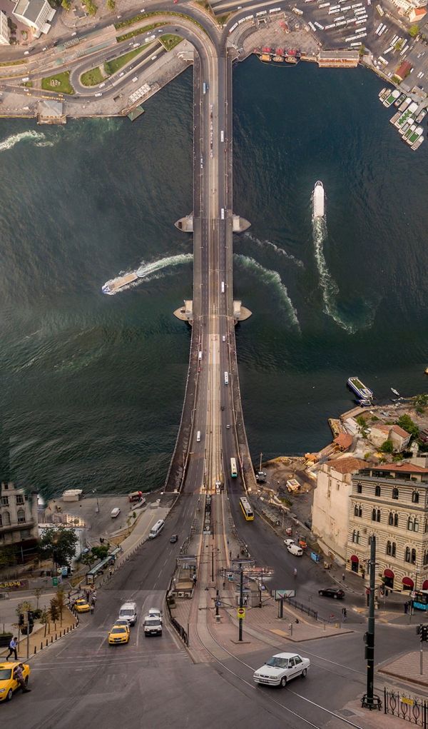 car,light,infrastructure,road surface,building,mode of transport