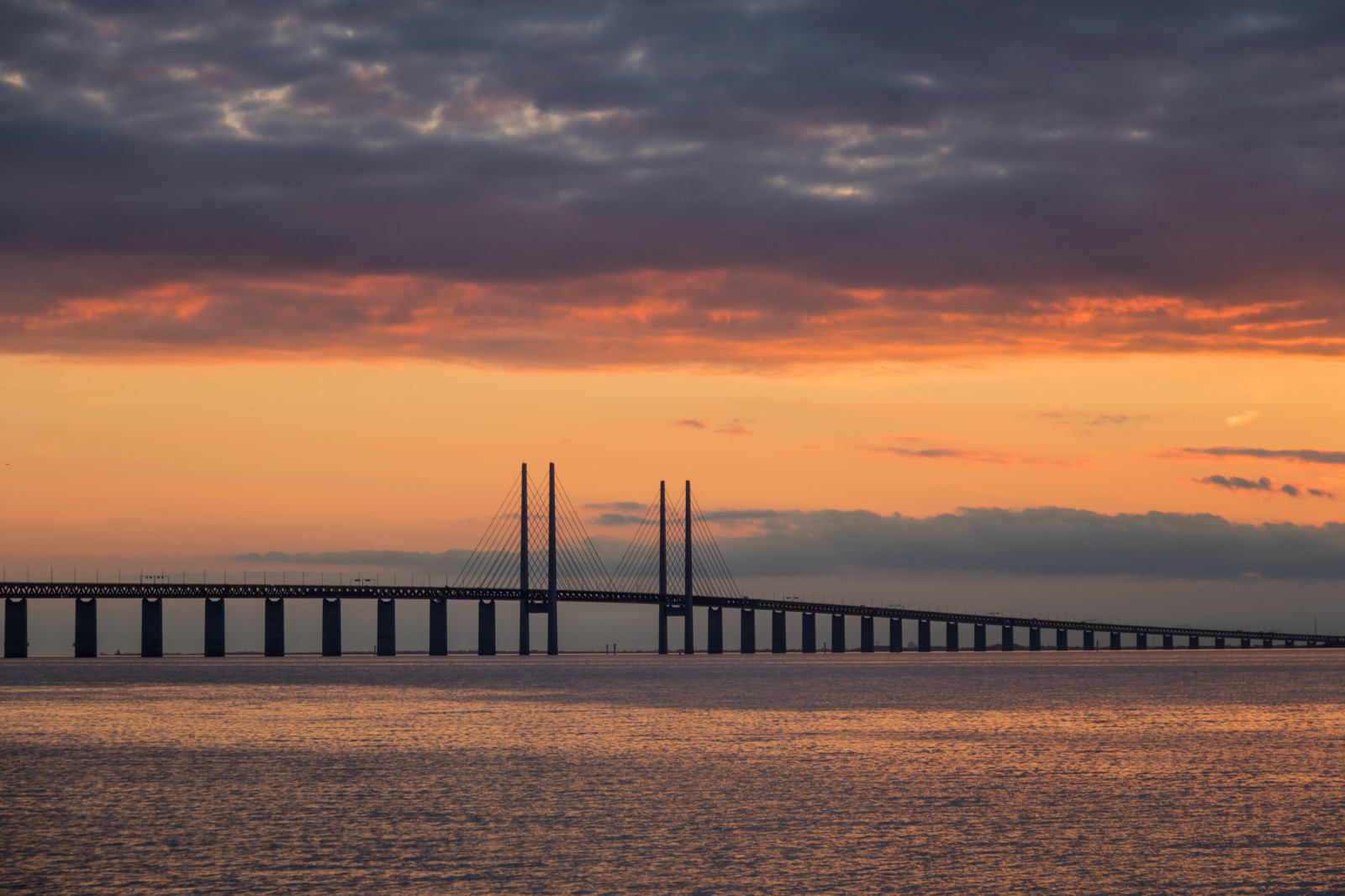 แสงแดด, พระอาทิตย์ตก, ทะเล, น้ำ, ฝั่ง, การสะท้อน, ท้องฟ้า, ชายหาด, พระอาทิตย์ขึ้น, ตอนเย็น, เช้า, ชายฝั่ง, สะพาน, ขอบฟ้า, ท่าเรือ, พลบค่ำ, Bro, เมฆ, รุ่งอรุณ, มหาสมุทร, คลื่น, solnedg ng, resundsbron, Vatten, hav, มัลโม, sibbarp, สายัณห์