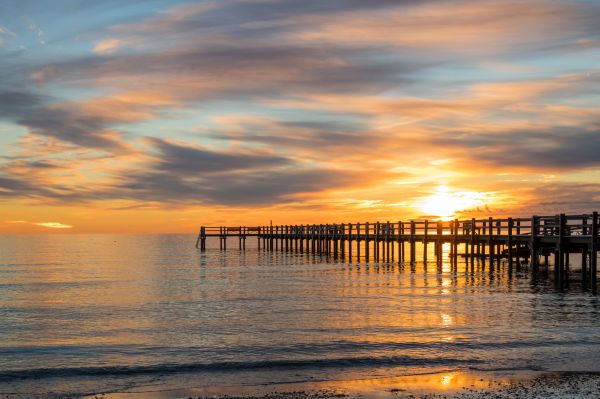 sunlight,sunset,sea,water,shore,reflection