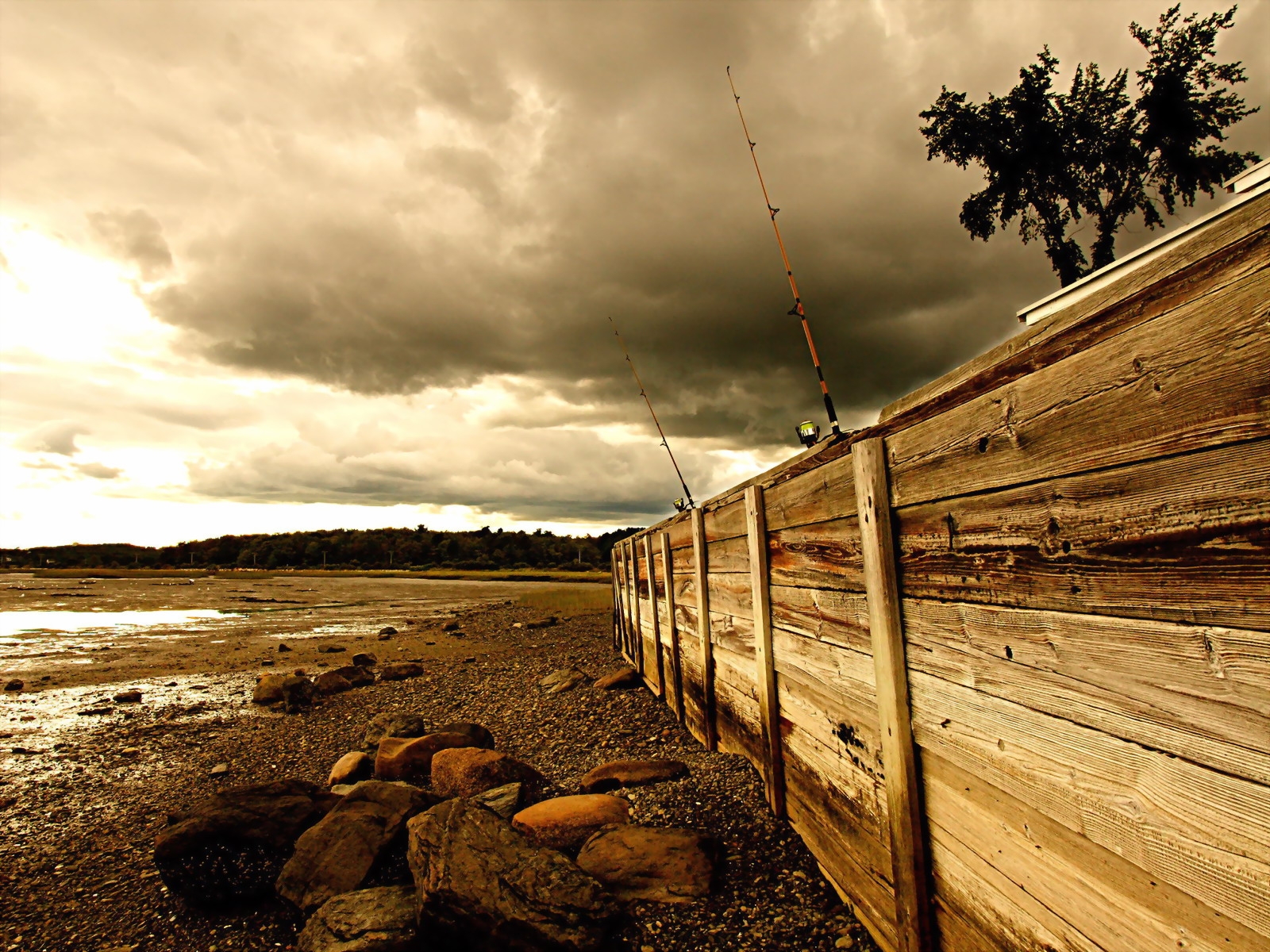 Wallpaper fence, stones, sea, coast, fishing tackles 1600x1200