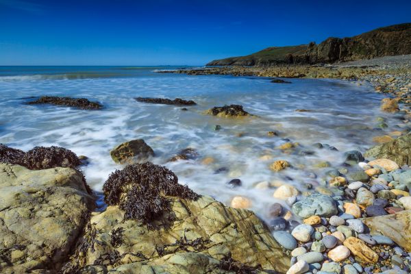 sky,beach,rocks,pebbles,sea,spring
