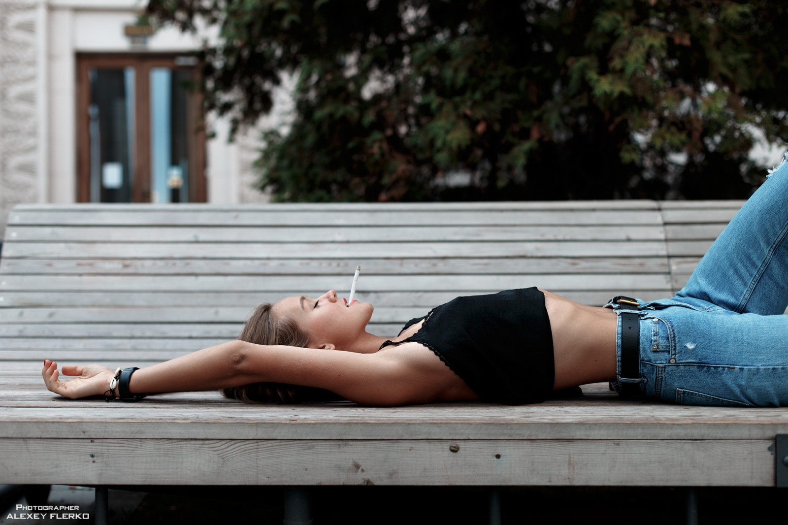Wallpaper model, bench, lying on back, black tops, belly