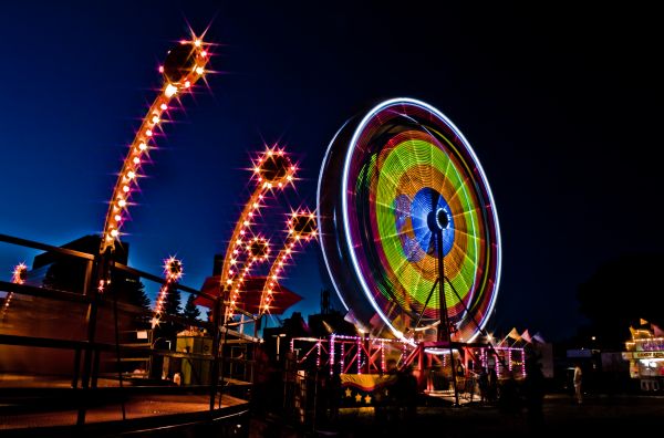 ferris wheel,amusement ride,fair,tourist attraction,amusement park,night