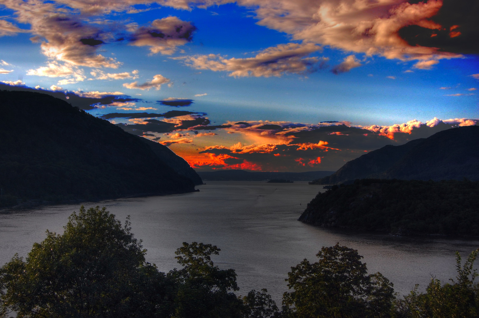 sky, nature, cloud, loch, dawn, highland, sunset, morning, lake, sunrise, evening, fjord, water, mountain, horizon, atmosphere, dusk, reflection, geological phenomenon, reservoir, sea, afterglow, landscape, river, sunlight, tree, coast, hill, meteorological phenomenon, mount scenery, bay, mountain range, computer wallpaper, ocean, calm
