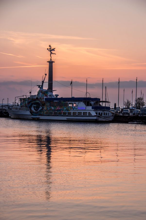 sunset,sea,boat,bay,reflection,vehicle