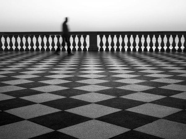 photography,monochrome,motion blur,fence,men,long exposure