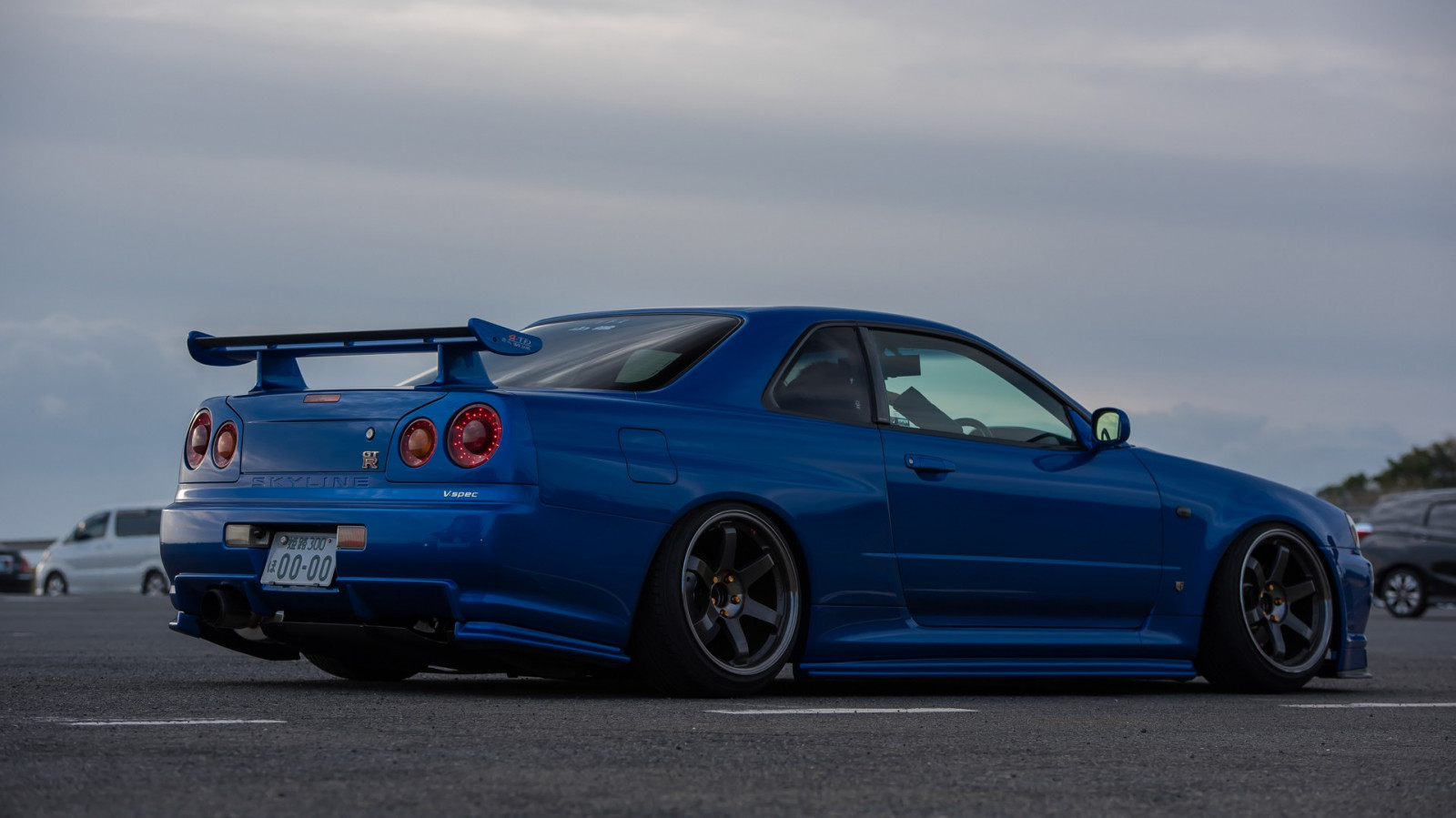 auto, auto blu, veicolo, orizzonte, Nissan, Honda, JDM, ruote, auto sportiva, Nissan Skyline, Stance, Nissan Skyline GT R, macchina di spettacolo, Skyline R34, curvatura, Nismo, Nissan Skyline GT R R34 Nismo Z Tune, Nissan Skyline GT R R34 Nismo, ruota, cerchione, supercar, veicoli terrestri, design automobilistico, esterno automobilistico, marca di automobile, paraurti